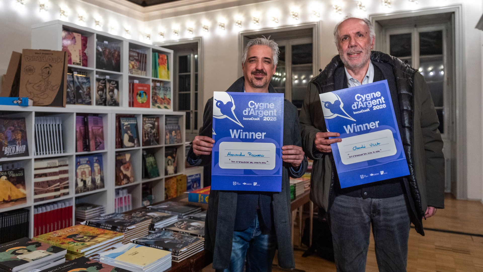 Tra nuvolette e cigni d'oro: sul lago si specchiano le opere premiate