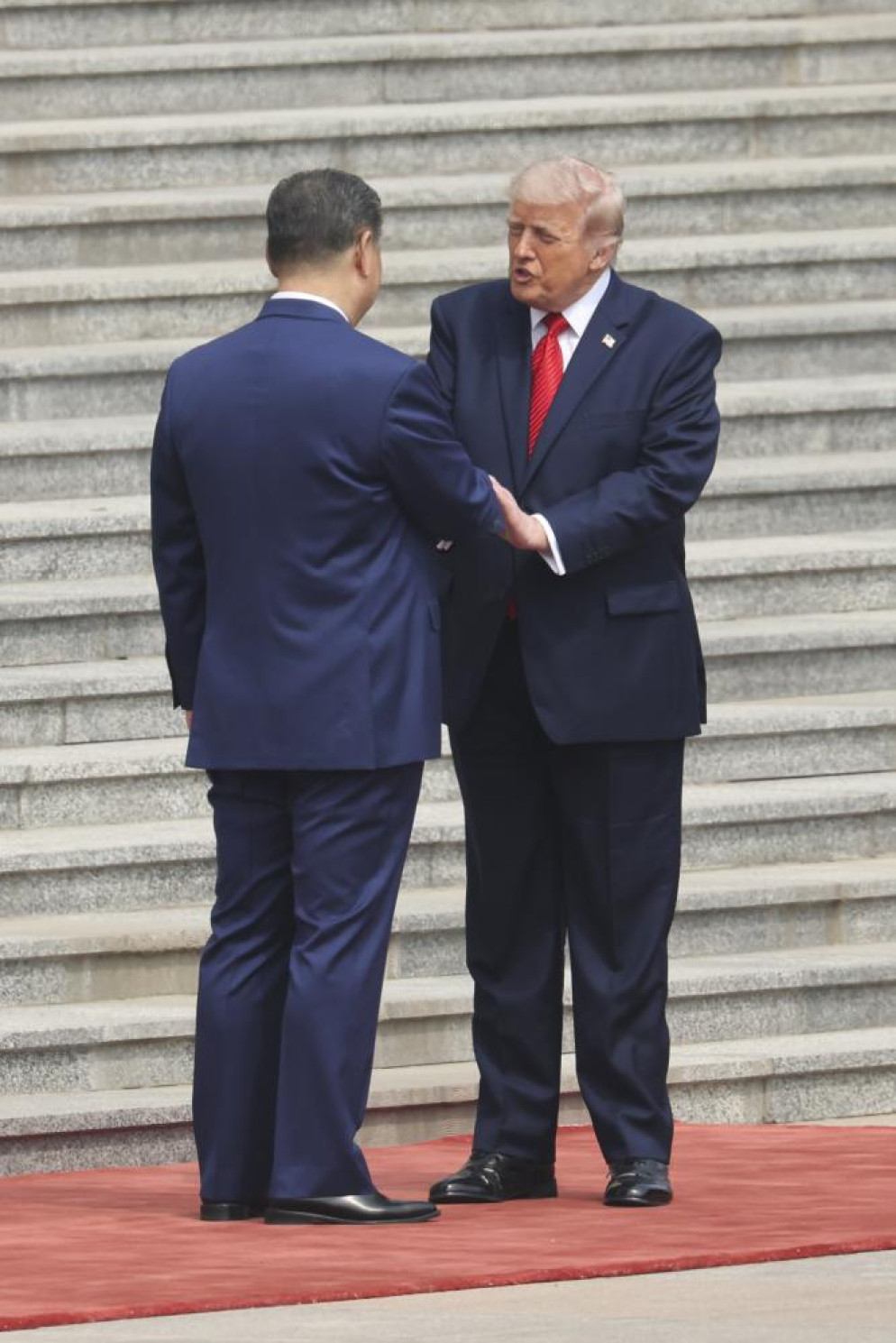 Il momento della storica stretta di mano tra Xi Jinping e Donald Trump. © KEYSTONE