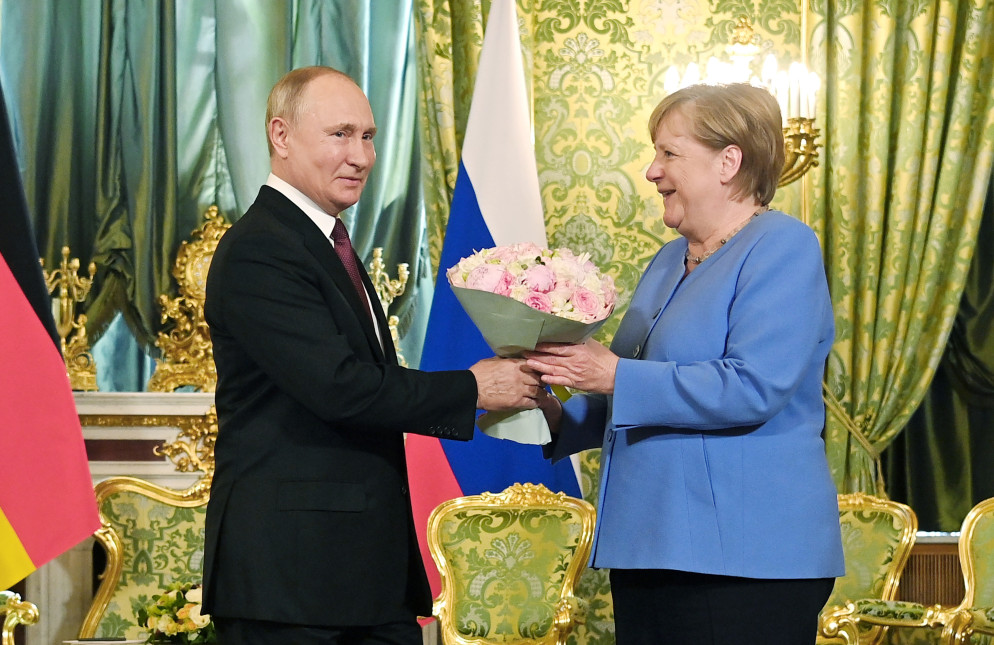 Putin e Merkel nel 2021. © Sputnik, Kremlin Pool Photo via AP